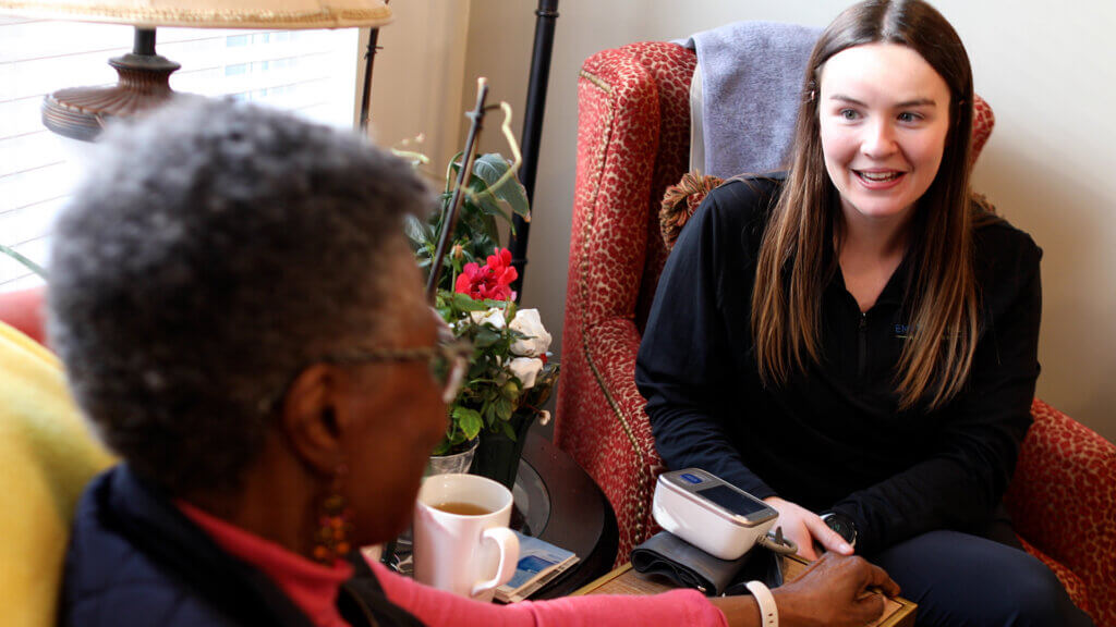 Care Navigator checking in on senior resident.